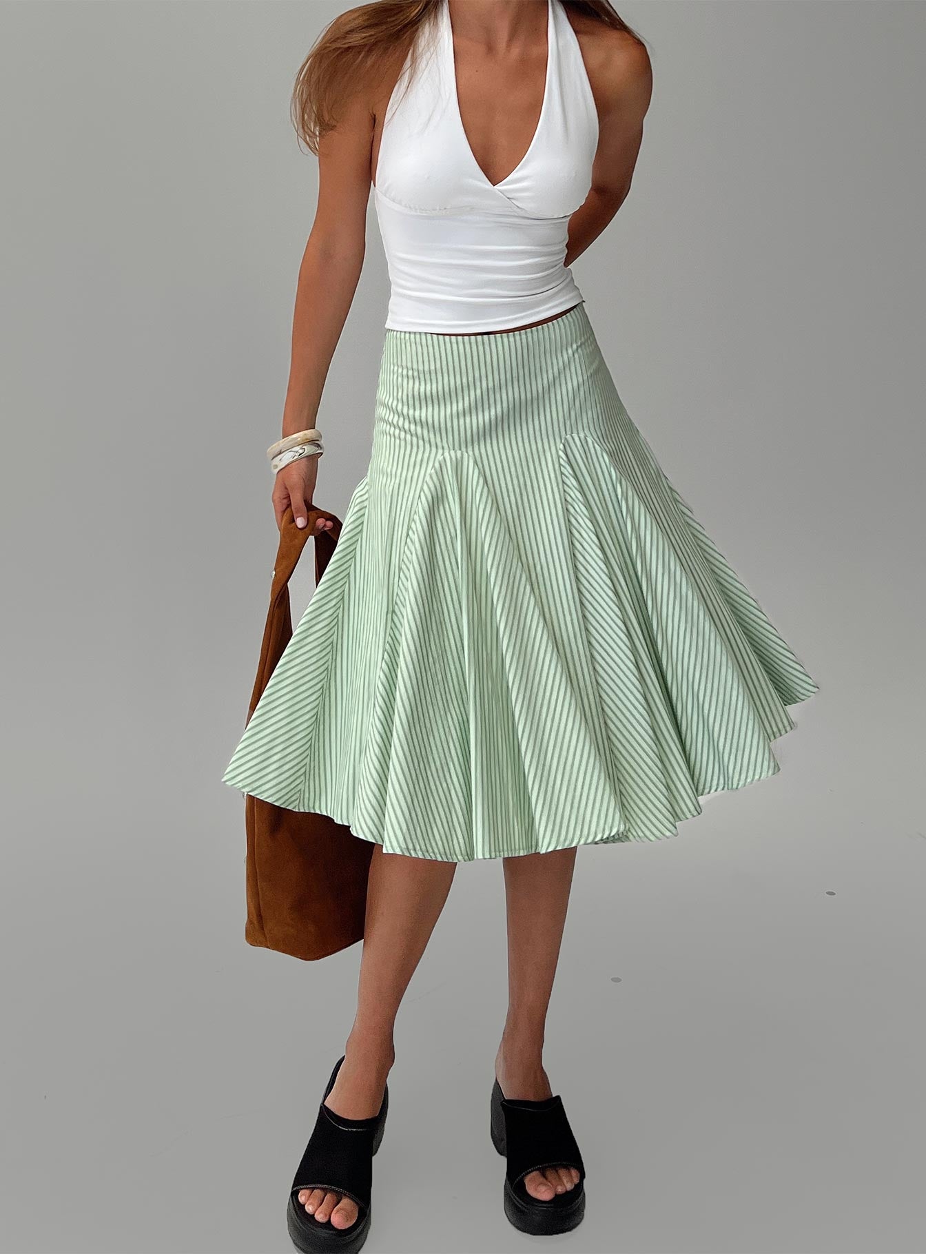 back view of model wearing Princess Polly Evangaleine Pleat Midi Skirt Green / White Midi Skirts 