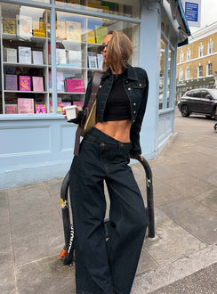 back view of model wearing Princess Polly Blue Crush Low Rise Wide Leg Jeans Indigo Mid Rise Jeans 