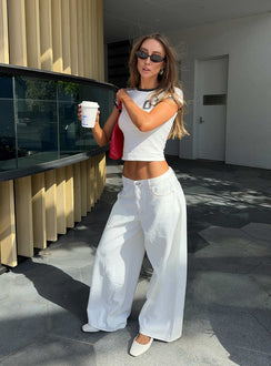 front view of model wearing Princess Polly Naylor Wide Leg Jeans Cream Petite Low Rise Jeans 