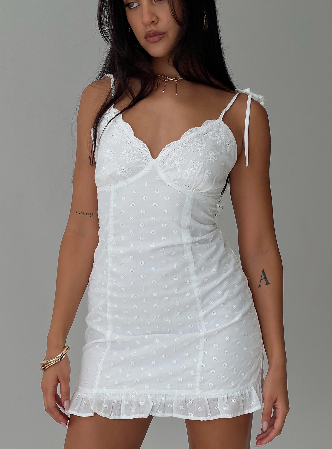 front view of model wearing Princess Polly Zenaida Mini Dress White V-Neck 