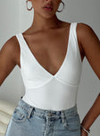 side view of model wearing Princess Polly Nellie Bodysuit White Sleeveless 