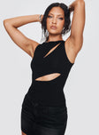 side view of model wearing Princess Polly Ablaze Cut Out Top Black Sleeveless High Neck 