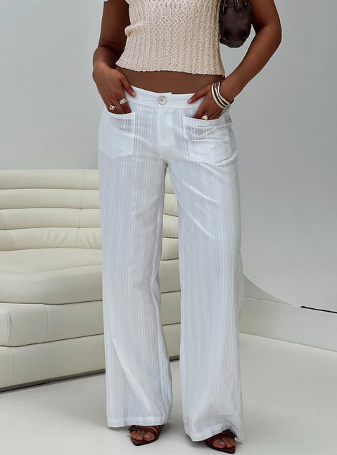 side view of model wearing Princess Polly Vendi Low Rise Pant White Low Rise Pants 