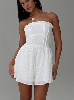 Strapless romper Embroidered flower print, inner silicone strip at bust, shirred elasticated band at back, frill detail at bust