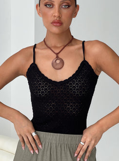 front view of model wearing Princess Polly Going For It Knit Bodysuit Black Sleeveless Asymmetric Neckline 