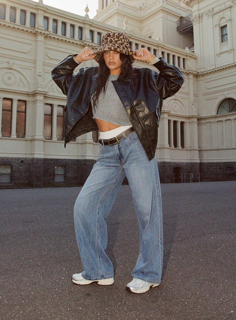 front view of model wearing Princess Polly Moonshine Wide Leg Jeans Mid Wash Mid Rise 