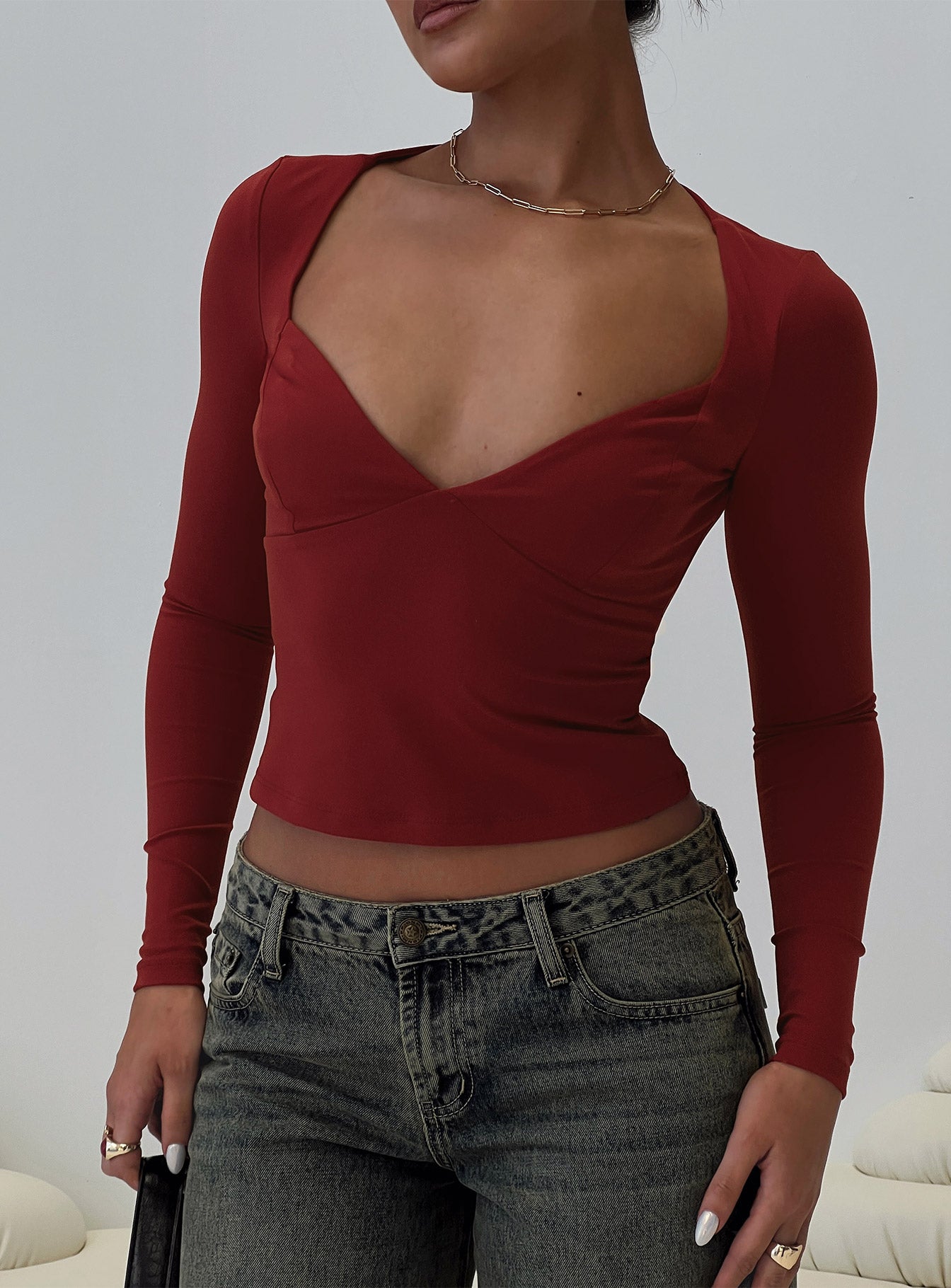 front view of model wearing Princess Polly Tonya Long Sleeve Top Red Full Sleeves Sweetheart 