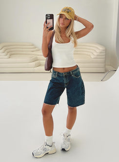 back view of model wearing Princess Polly Cult Classic Longline Denim Shorts Vintage Wash Low Rise Shorts 