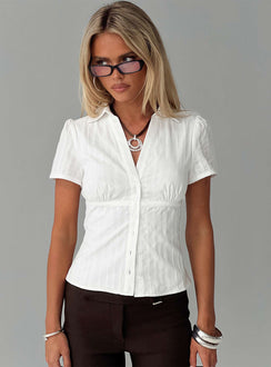 front view of model wearing Princess Polly What A Show Button Up Top White Short Sleeves V-Neck 