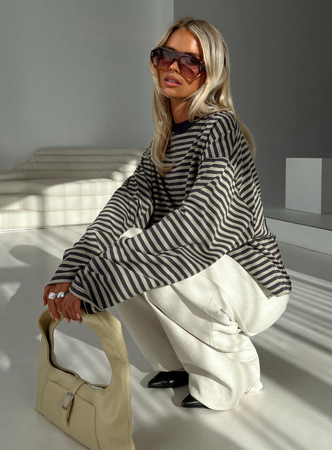 side view of model wearing Princess Polly Bloom Long Sleeve Top Beige Stripe Full Sleeves Crew Neck 