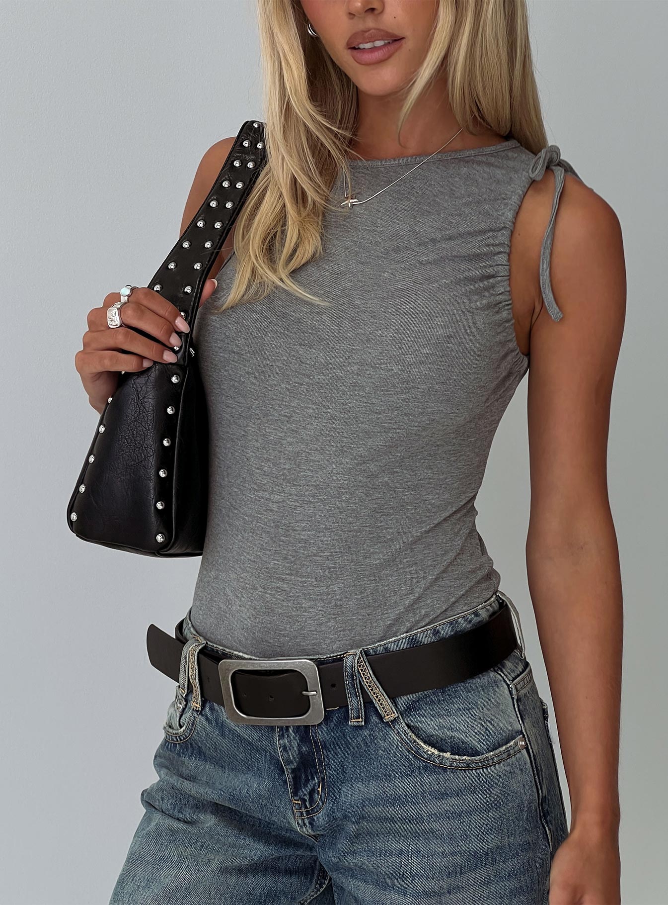 side view of model wearing Princess Polly Magnetism Bodysuit Grey Sleeveless 