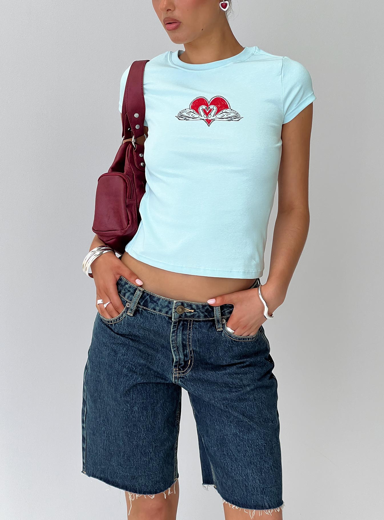 front view of model wearing Princess Polly Sweet Swans Baby Tee Blue Short Sleeves Crew Neck 