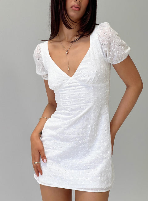 front view of model wearing Princess Polly Viella Broiderie Mini Dress White V-Neck 