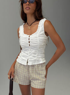 front view of model wearing Princess Polly Almeda Button Up Top White Sleeveless Scoop Neck 