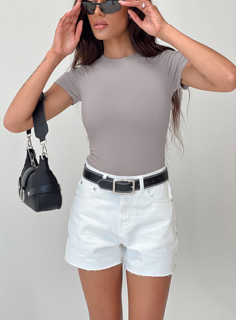 front view of model wearing Princess Polly Jannika Shorts White Denim High Waisted Shorts 