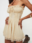 Strapless playsuit  Lace details, ruffle neckline, adjustable tie at neckline, shirred back, twin hip pockets 