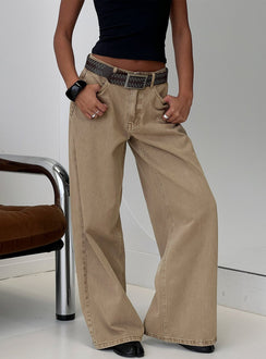 front view of model wearing Princess Polly Naylor Mid Rise Wide Leg Jeans Light Brown Wash Mid Rise Jeans Jeans 