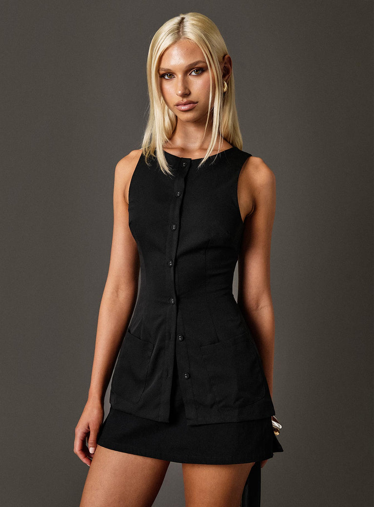 Vest top High neckline, button fastening, twin hip pockets, tie detail at back Non-stretch material, fully lined 