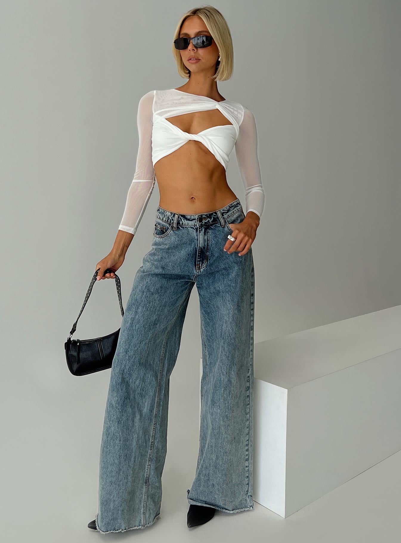 front view of model wearing Princess Polly Middleton Long Sleeve Top White Full Sleeves Asymmetric Neckline 