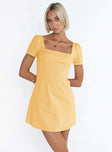 Front view of model wearing  front Princess Polly Square Neck  Hastings Mini Dress Yellow