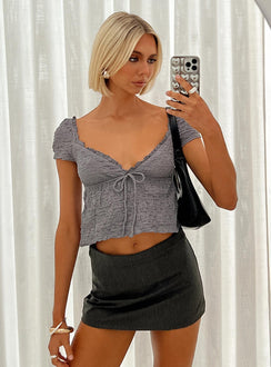 front view of model wearing Princess Polly Kellan Cap Sleeve Top Blue Short Sleeves Plunger 