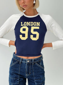 front view of model wearing Princess Polly London 95 Long Sleeve Top Navy Full Sleeves Crew Neck 