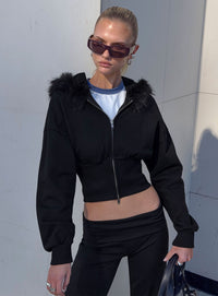 Showcasing the Ramonda Faux Fur Hooded Jumper Black womens-jumpers in short length front view of model wearing Princess Polly