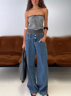 front view of model wearing Princess Polly Hannalee Low Rise Wide Leg Jeans Mid Blue Wash Low Rise Jeans 