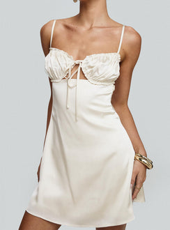 side view of model wearing Princess Polly Decipher Satin Mini Dress Ivory Sweetheart Neckline 