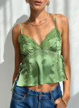 Silky top V neckline, adjustable straps, lace trim detail, split hem at sides with tie Non-stretch material, lined bust