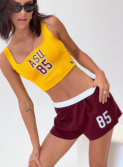 front view of model wearing Princess Polly ASU Soffee Shorts Maroon High Waisted Shorts 