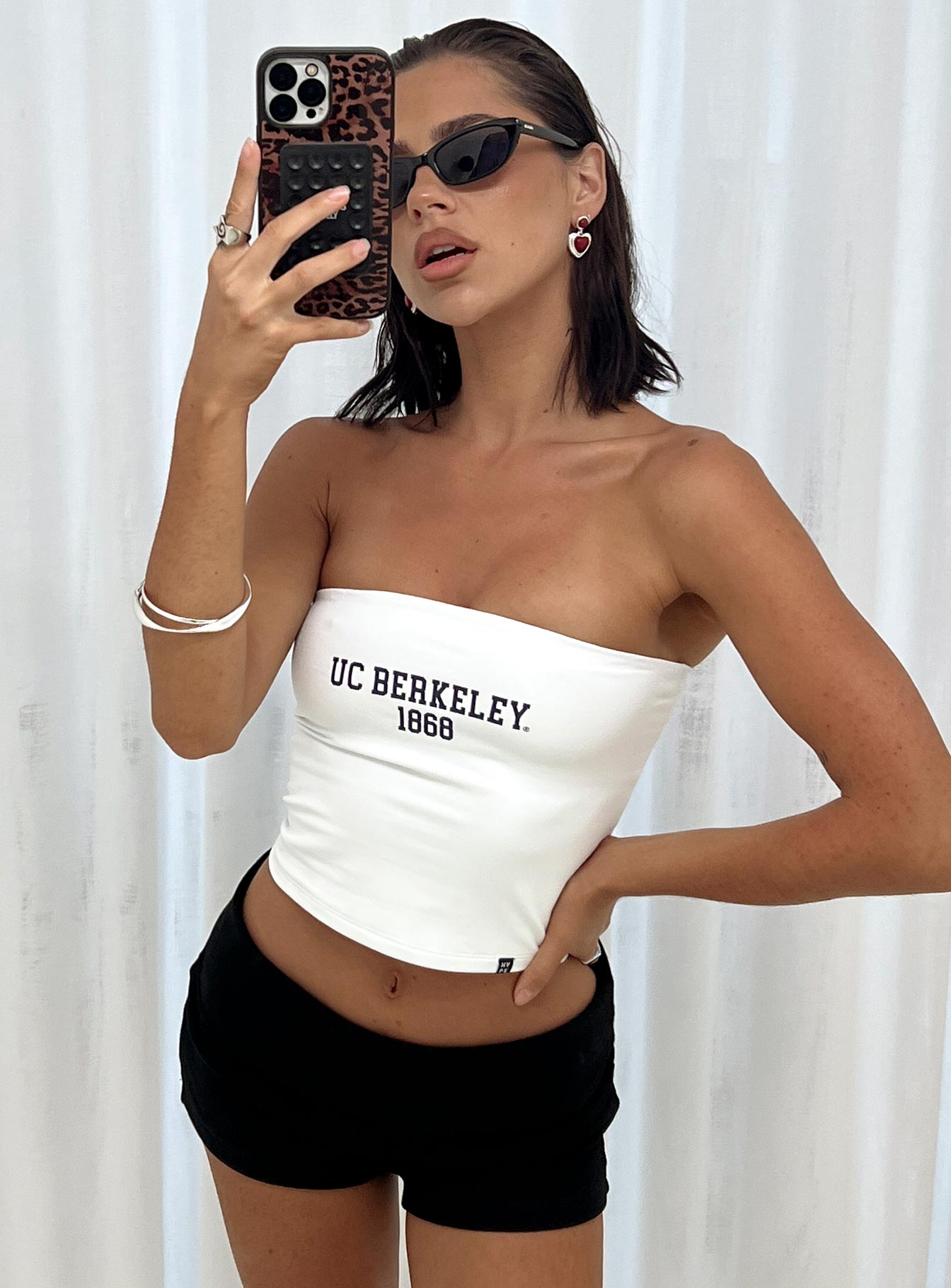 front view of model wearing Princess Polly UC Berkeley Tube Top White Sleeveless straight 