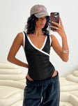 front view of model wearing Princess Polly Fiorah Bodysuit Black / White Sleeveless 