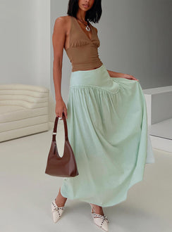   side view of model wearing Princess Polly Yasemine Maxi Skirt Green / White Maxi 