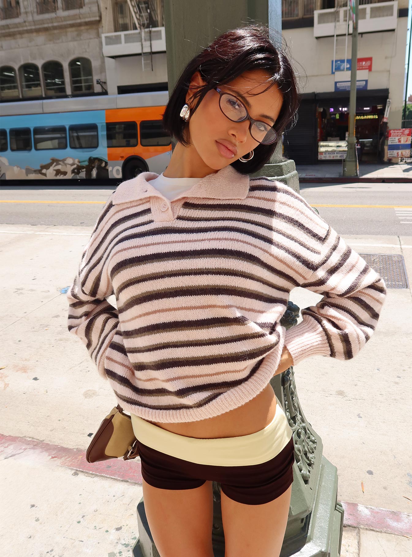 side view of model wearing Princess Polly Jeanny Collared Knit Sweater Brown / Pink Stripe Longline Jumpers 