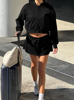 front view of model wearing Princess Polly Down Low Fleece Skort Black Low Rise Shorts 