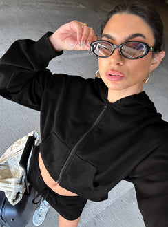 side view of model wearing Princess Polly Revive Zip Through Hoodie Black cropped 