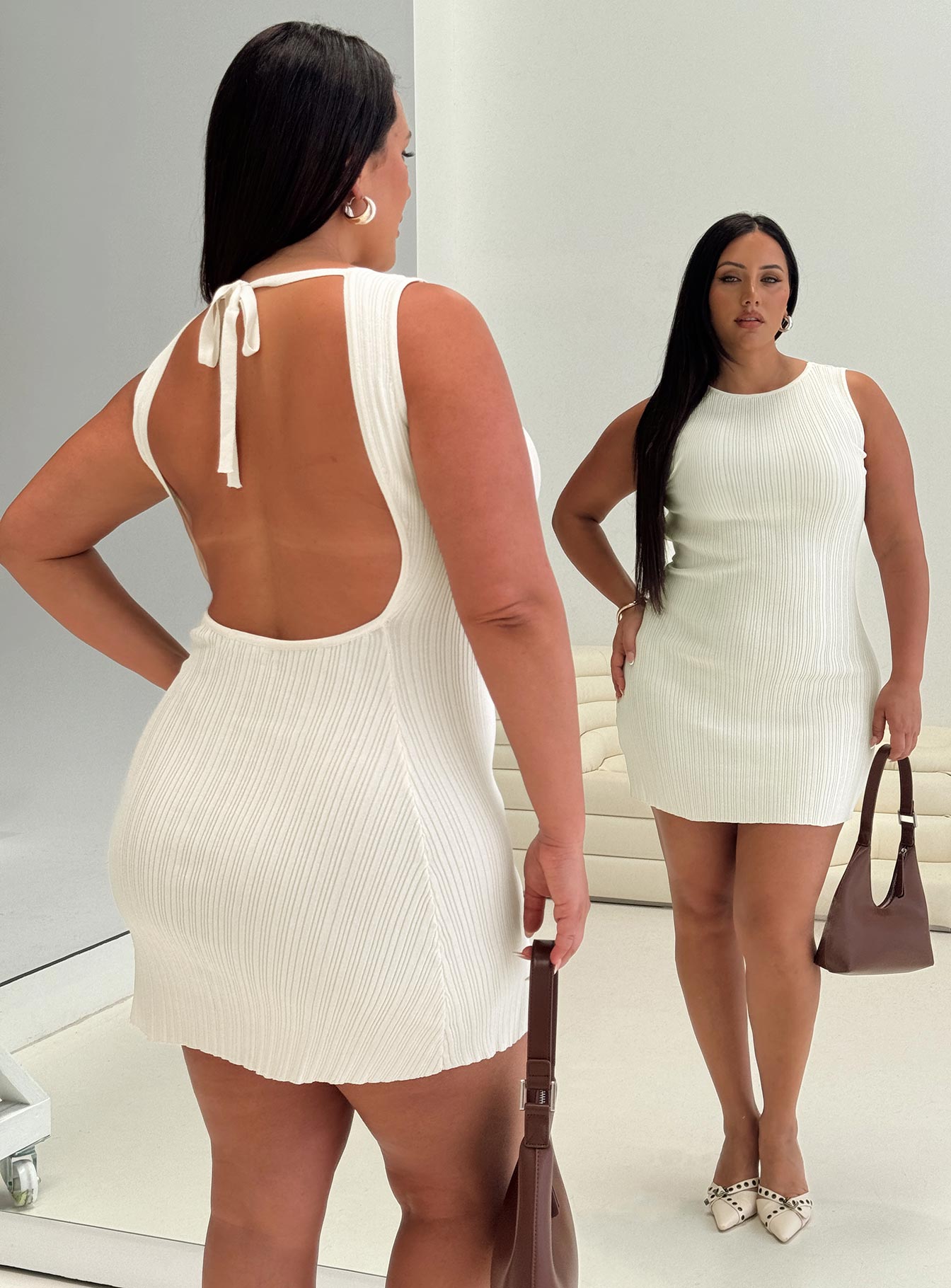 back view of model wearing Princess Polly Mayok Mini Dress Cream Curve Crew Neck 