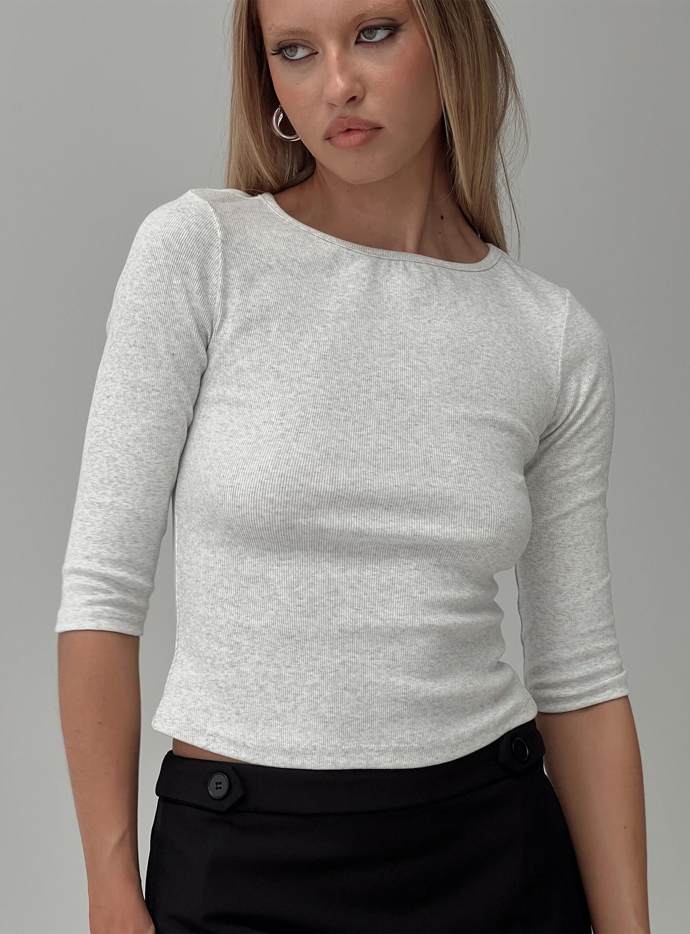 front view of model wearing Princess Polly Elaia 3/4 Sleeve Top Grey Marle Three Fourth Sleeves Crew Neck 