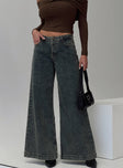 back view of model wearing Princess Polly Ziggie Low Rise Ultra Baggy Jeans Antique Wash Low Rise Jeans 