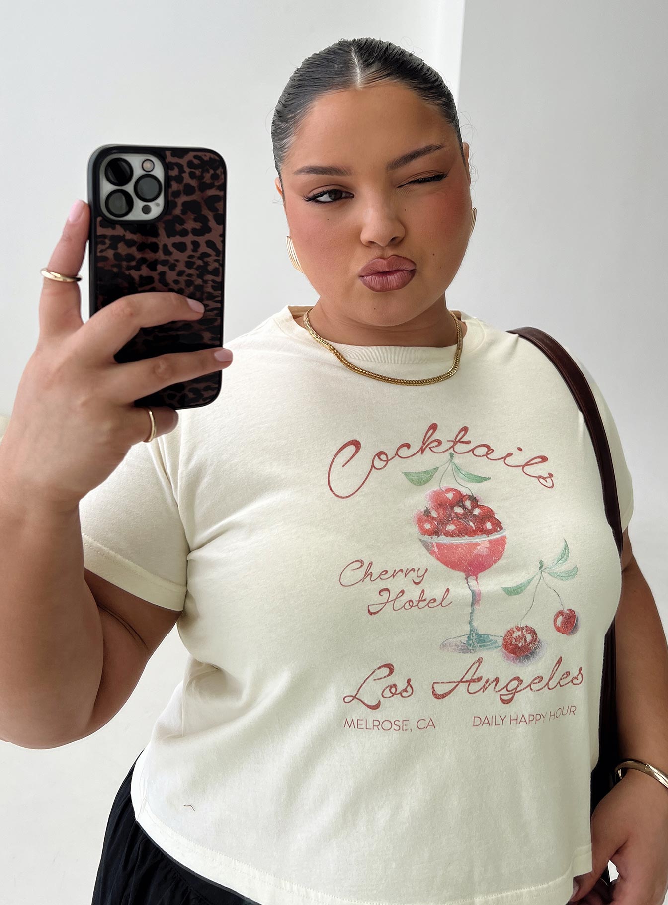 front view of model wearing Princess Polly Cherry Cocktails Tee Cream Curve Short Sleeves Crew Neck 