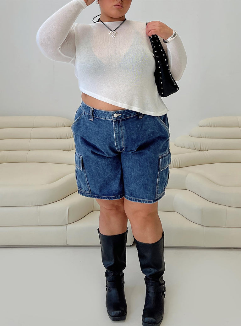 front view of model wearing Princess Polly Mika Carpenter Denim Shorts Mid Wash Curve 