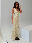 side view of model wearing Princess Polly Ridgewood Maxi Dress Beige Floral Plunger 