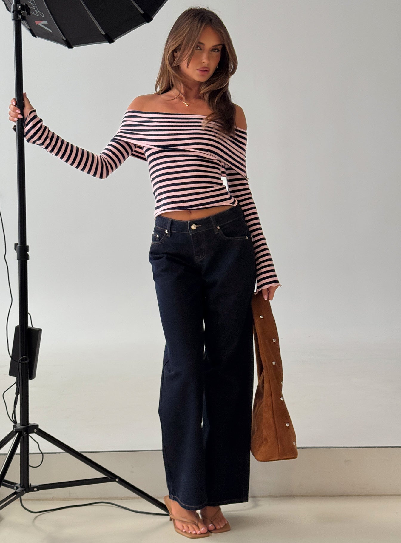 front view of model wearing Princess Polly Ellanor Low Rise Straight Leg Jeans Indigo Blue Low Rise Jeans 