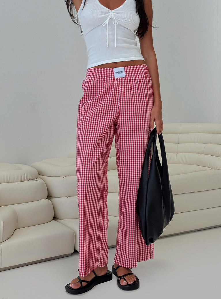 back view of model wearing Princess Polly Beach House Pants Red Gingham High Waisted Pants 