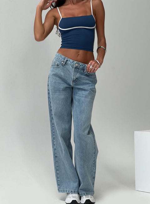 front view of model wearing Princess Polly Serenitia Mid Rise Relaxed Jeans Light Wash Tall Mid Rise 
