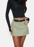 back view of model wearing Princess Polly Gonzales Mini Skirt Olive Mini Skirts 