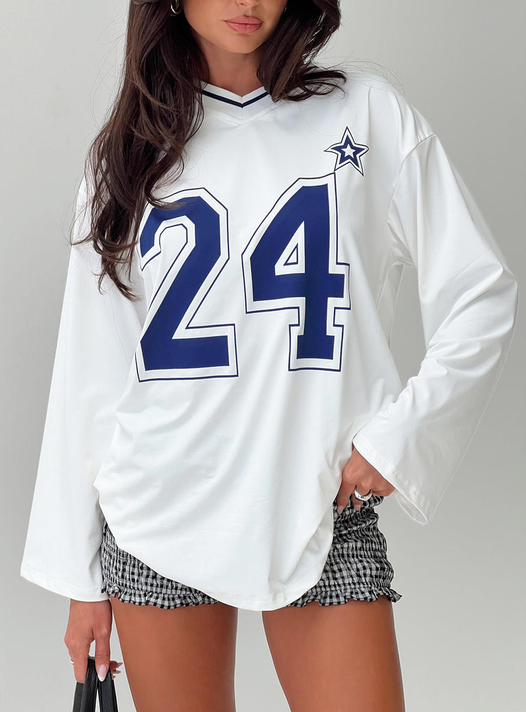 front view of model wearing Princess Polly Star Player Long Sleeve Top White Full Sleeves V-Neck 