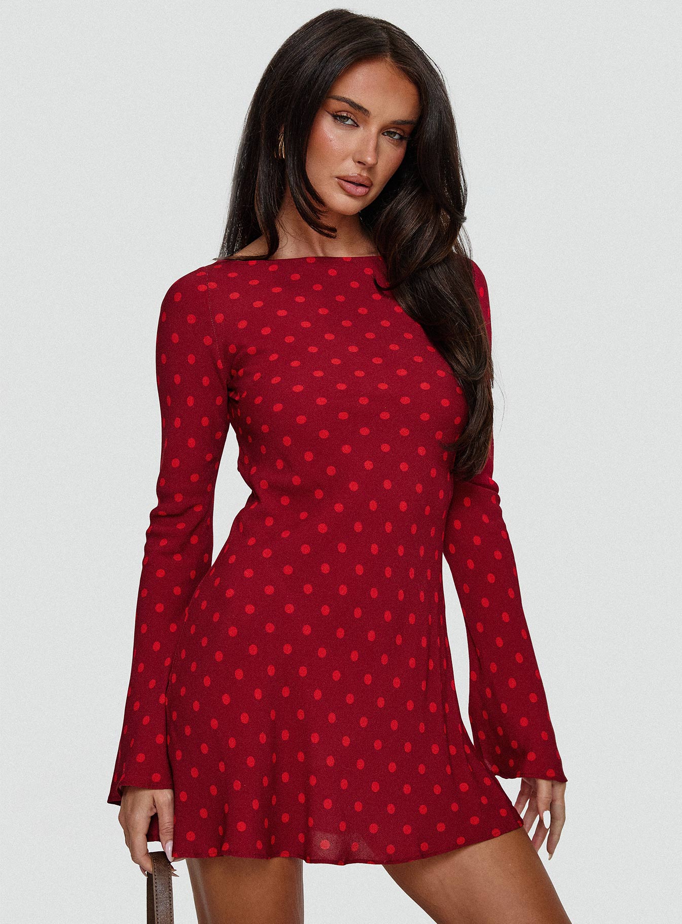 front view of model wearing Princess Polly Good Graces Long Sleeve Mini Dress Red Dot Boat Neck 