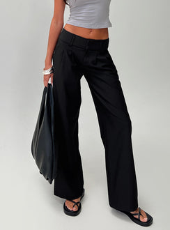 front view of model wearing Princess Polly Two Lovers Low Rise Pants Black Tall Low Rise Pants 
